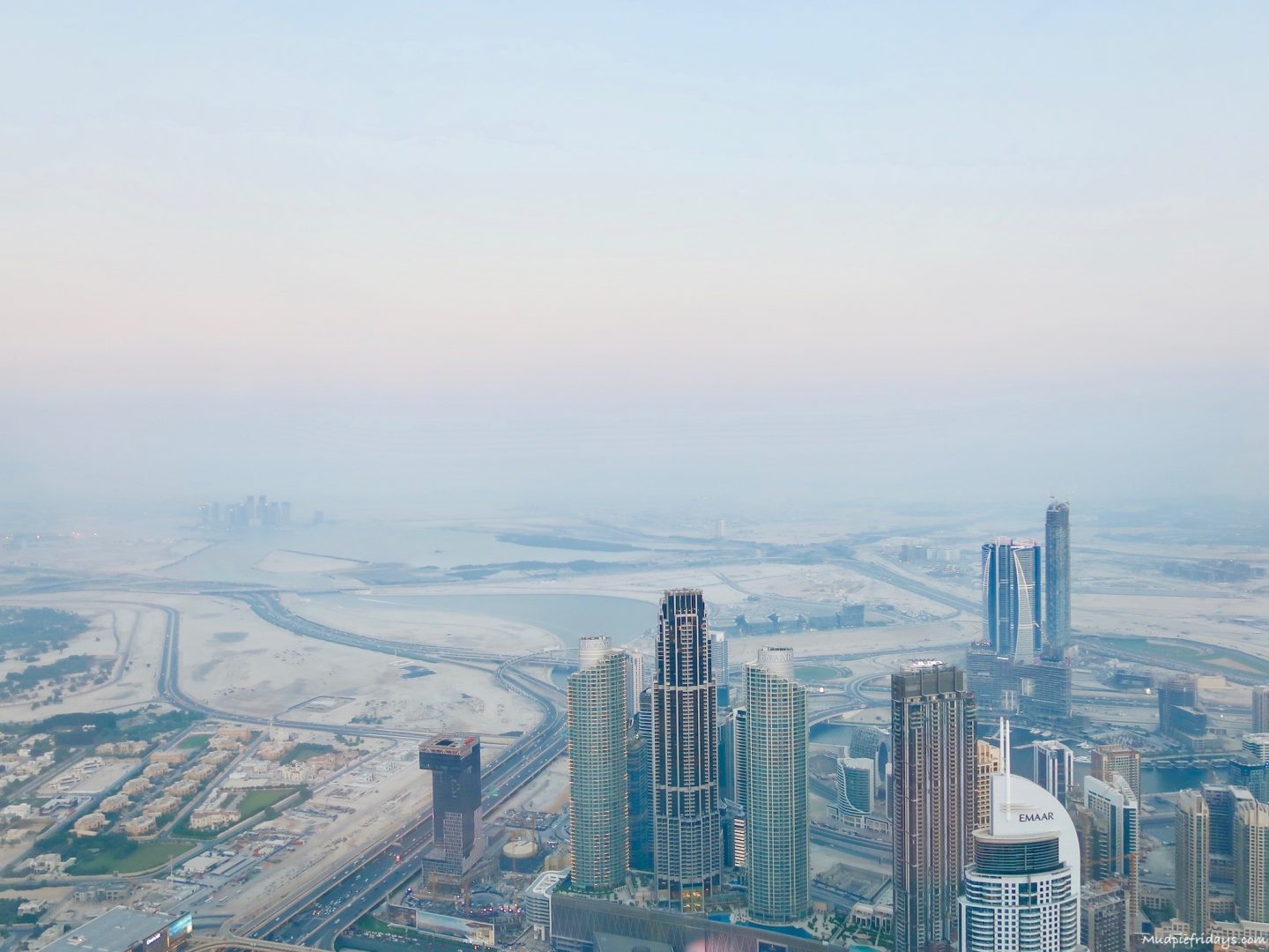 Views of the Dubai skyscrapers with mist in the distance