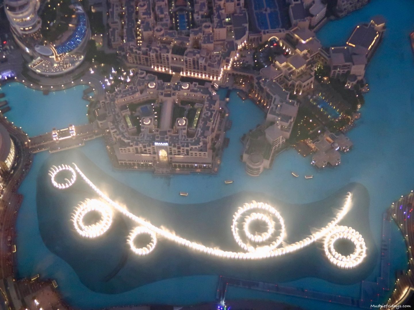 Views of the fountains from the 125th Floor Burj Khalifa in the dark so you can see all the fountains lit up