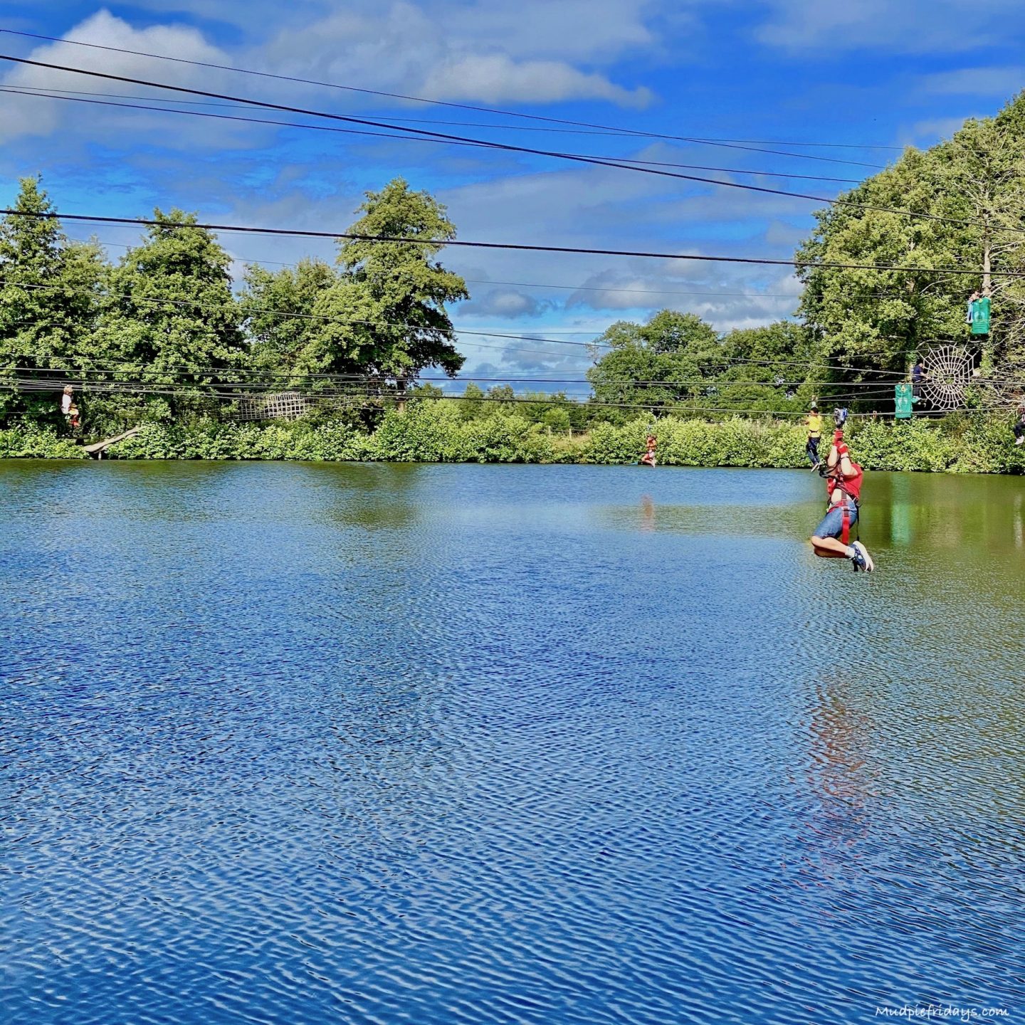 Zip lining across the lake