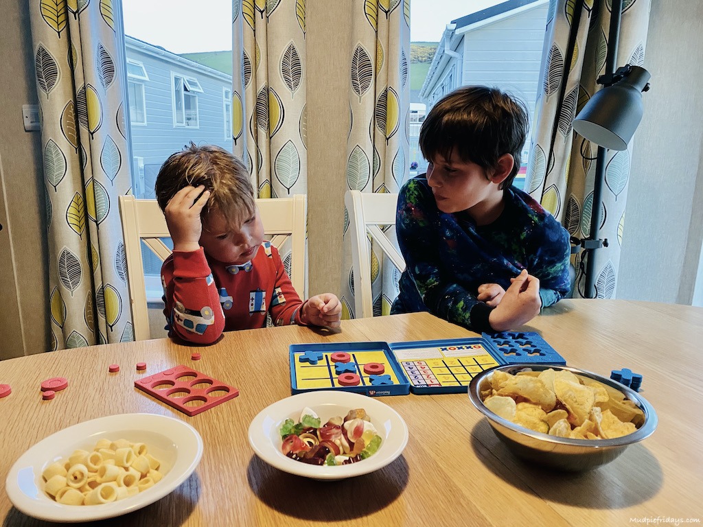 Boys playing a travel game