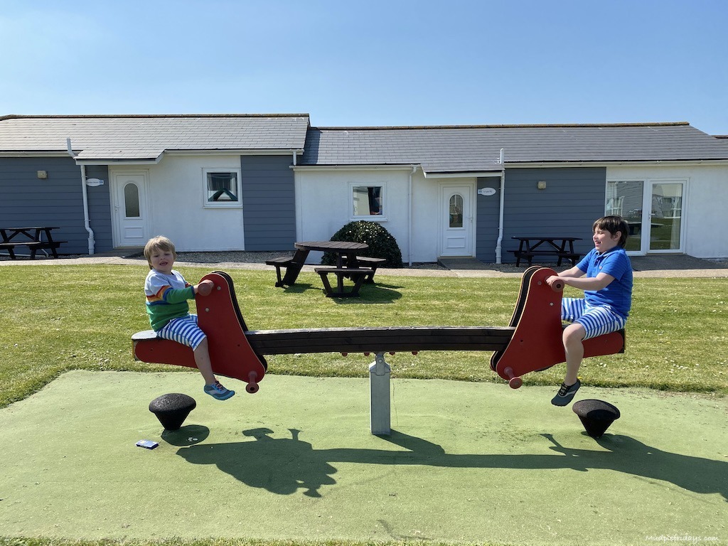On the seesaw at Croyde Bay Resort in Devon - childrens play area