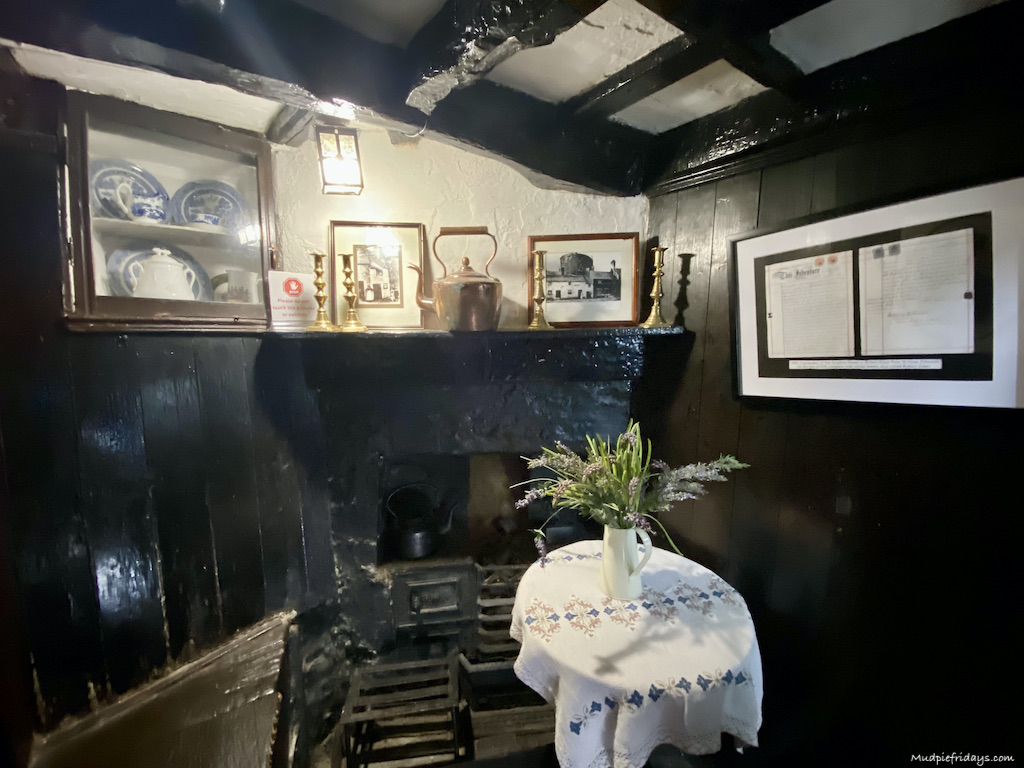 The downstairs room of the smallest house in Great Britain