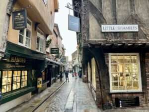 The shambles york including Little Shambles sign at 10 am in the morning before it gets busy