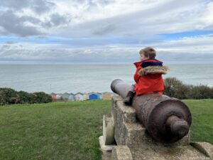 Cannon on Tankerton seafront over looking slops and the beach huts