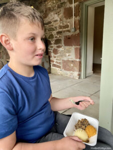 tasting haggis at the haggis experience in Scotland