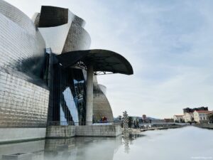 The Guggenheim in Bilbao with the dry ice being released in front of it