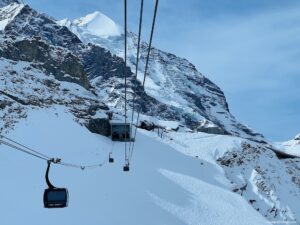The Eiger Express with the mountains in Switzerland in the background