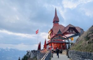 The star lit up on the front of the Harder Kulm restaurant and the archway confirming the height