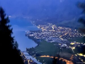the view of Interlaken at night from the funicular coming down at Harder Kulm