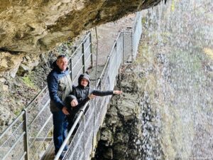 Walking under Giessbach falls and getting wet!