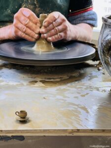 watching the potter making mugs at the Ballenberg swiss open air museum and a tiny cup and saucer out of clay