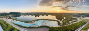 The Aqualagon at Les Villages Nature Paris at sunset.