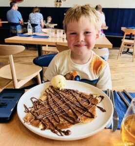 Harry with his Sweet Crepe with ice cream at Creperie Suzette restaurant at Center Parcs Disneyland Paris
