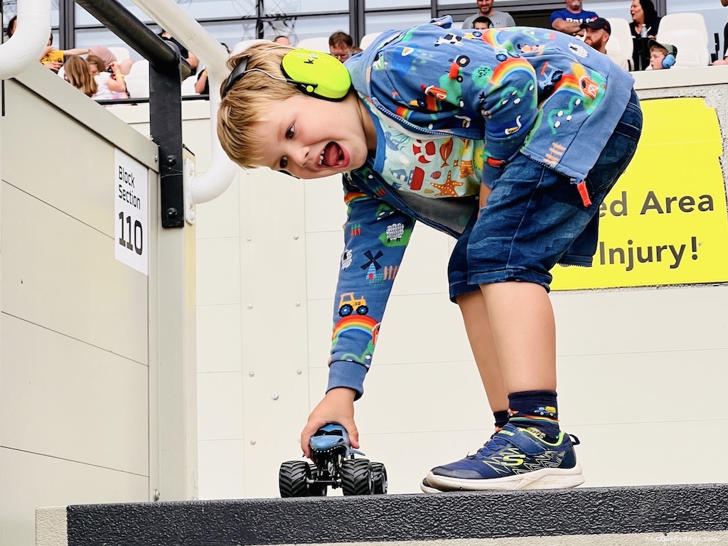 Harry playing with his spinmaster die cast monster truck megaladon at the monster jam held at the London stadium in the UK