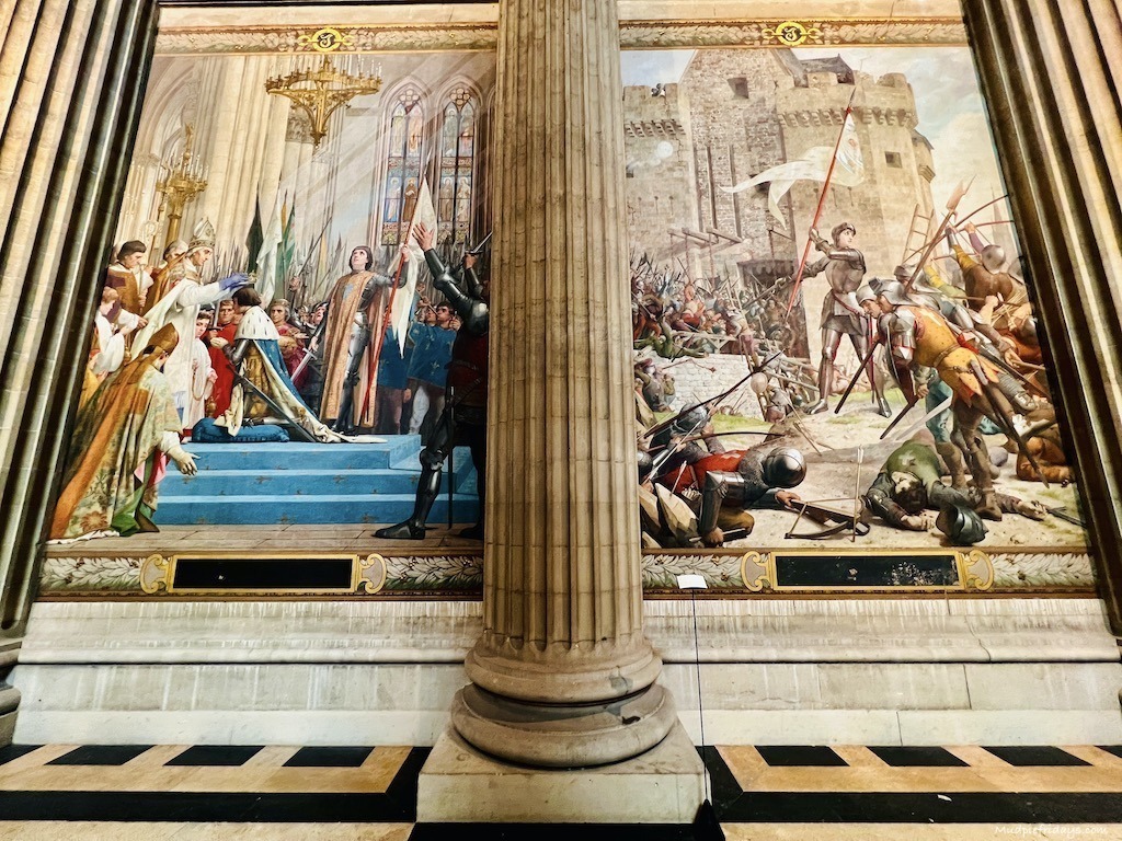 Joan of Arc murals depicting her story during our visit to the Pantheon Paris