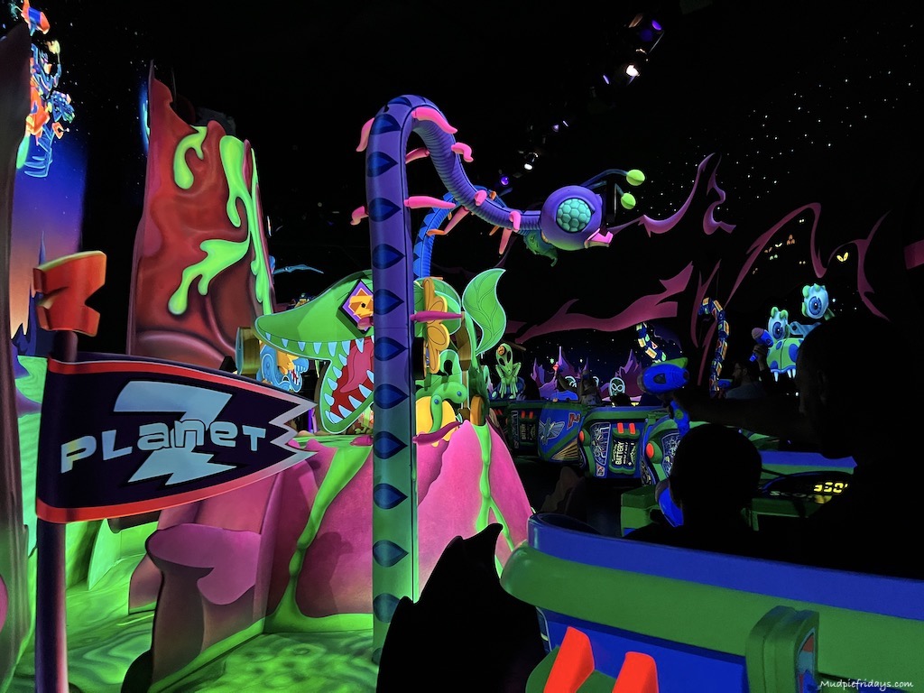 The inside of Buzz Lightyear Laser Blast ride