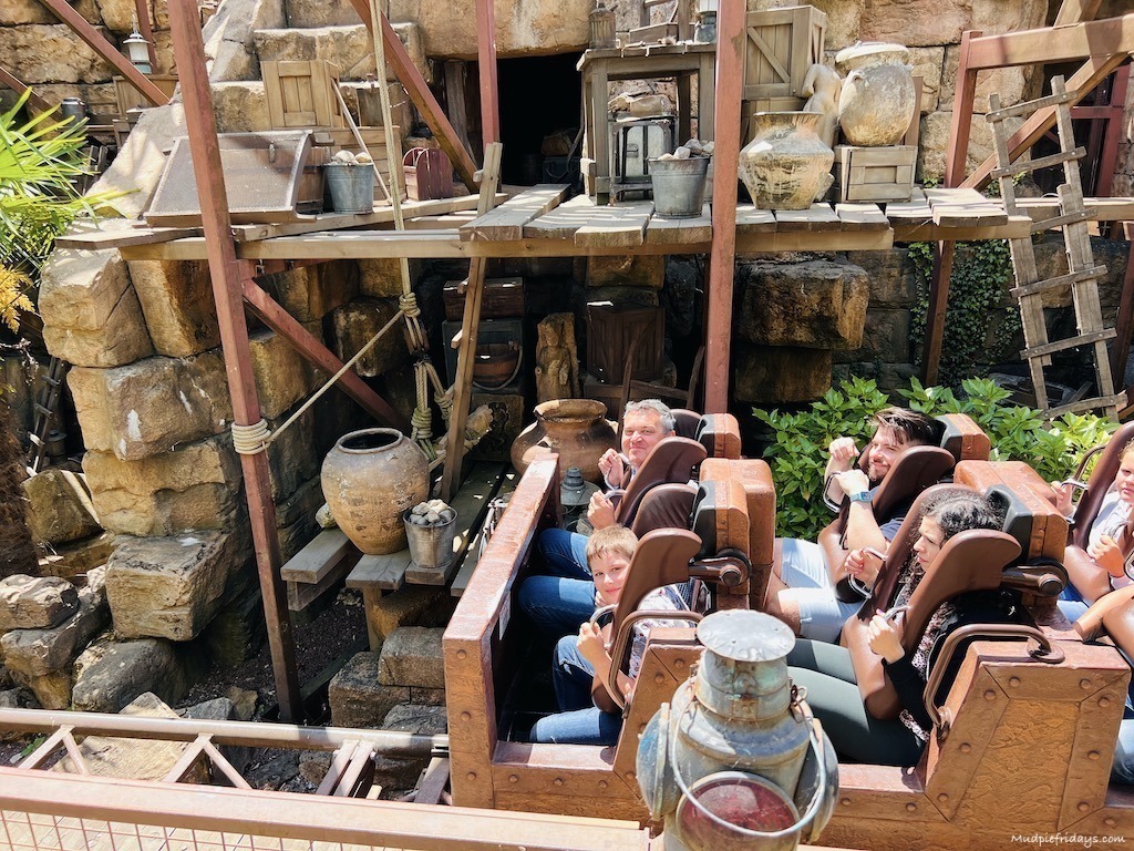 The boys sitting on the Disneyland Paris Indiana Jones