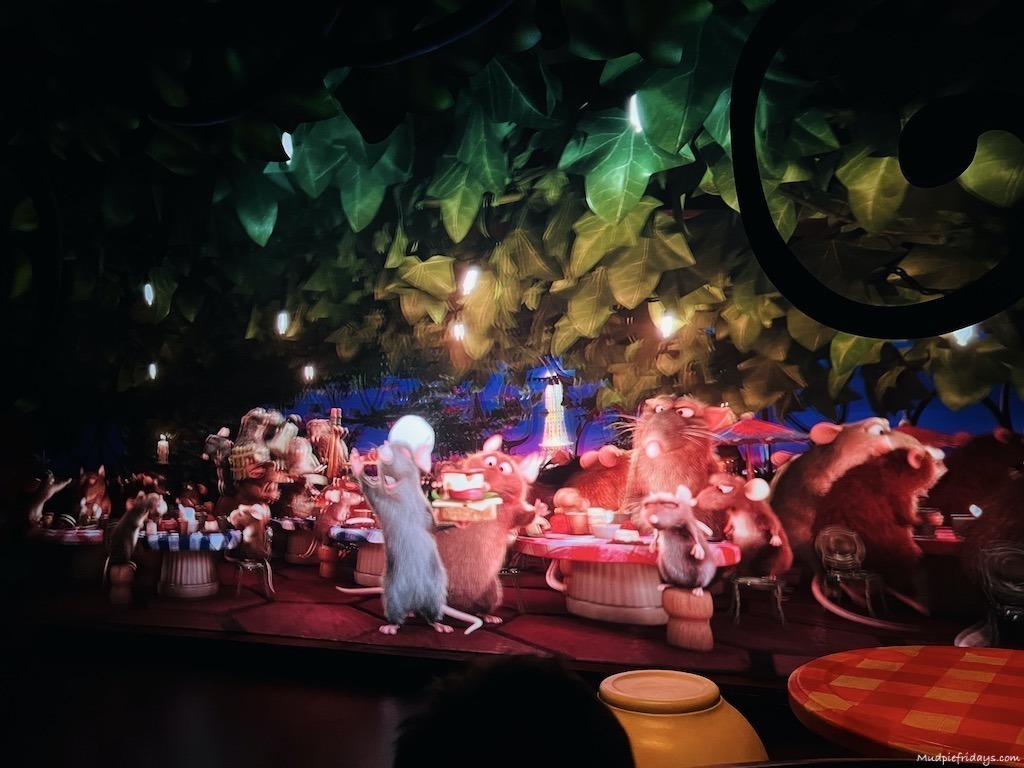 inside Ratatouille Disney Land with one of the large 4D screens that make up the ride