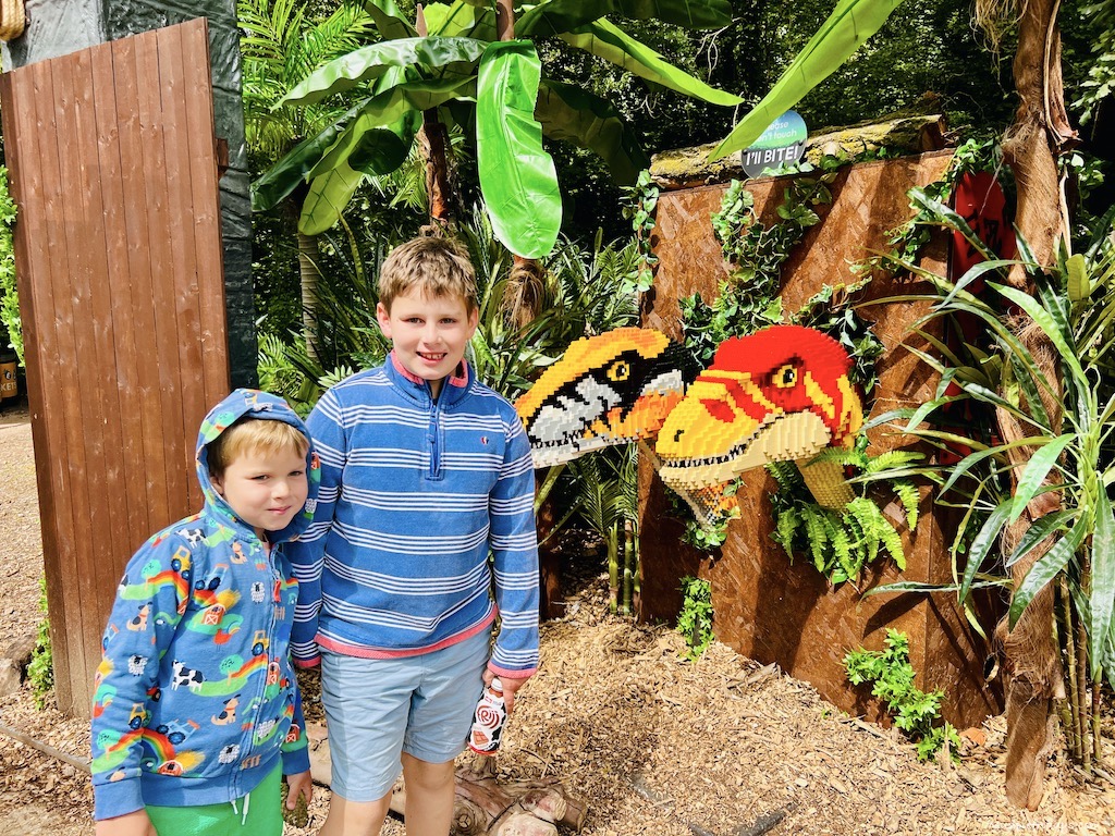 The boys at the entrance to Marwell zoo and the Brickosaurs event