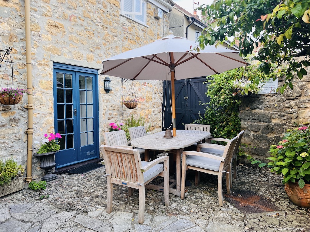 The courtyard for dining alfresco at Eastbury Cottage part of The Eastbury Hotel and Spa in Sherbone, Dorset