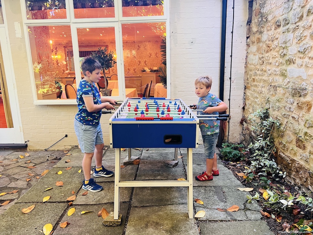 The boys playing table football at the Eastbury Hotel and Spa - Spa hotels in Dorset