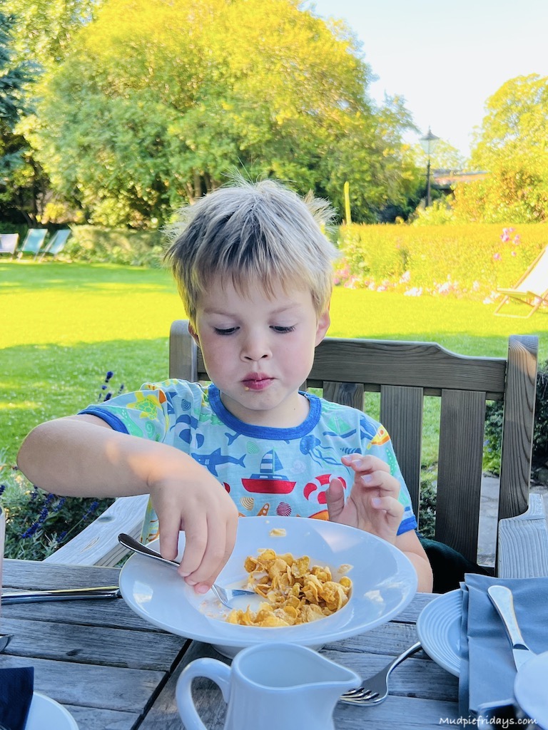 Harry eating breakfast outside on the veranda at The Eastbury Hotel and Spa