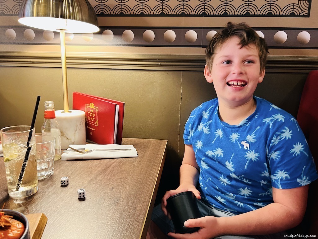 Charlie rolling dice