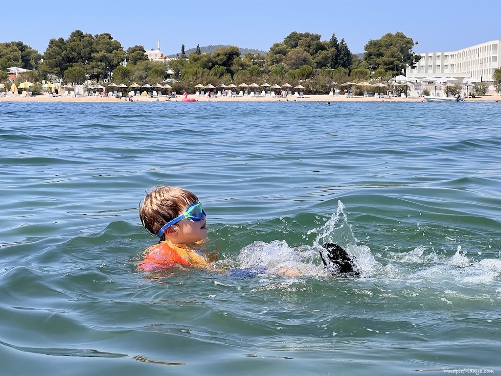 Harry swimming in the sea in Sibenik Croatia