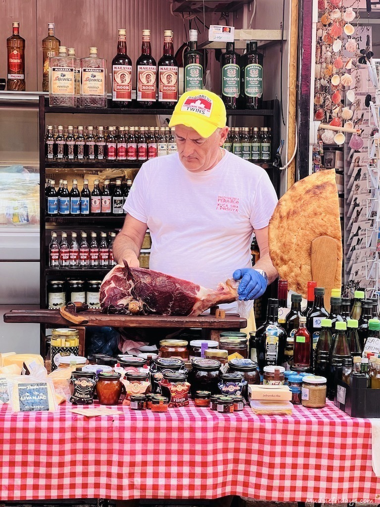 preparing meat for sale in split