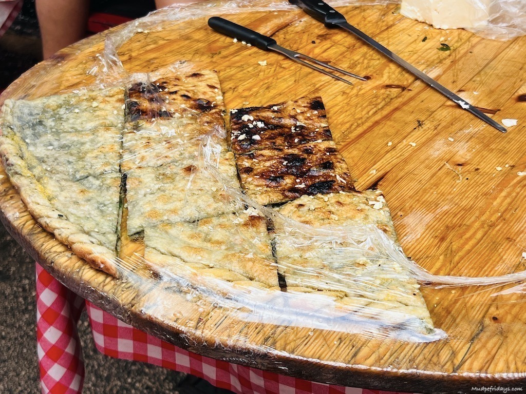 local food - spinach and garlic flat bread in Green Market in Split