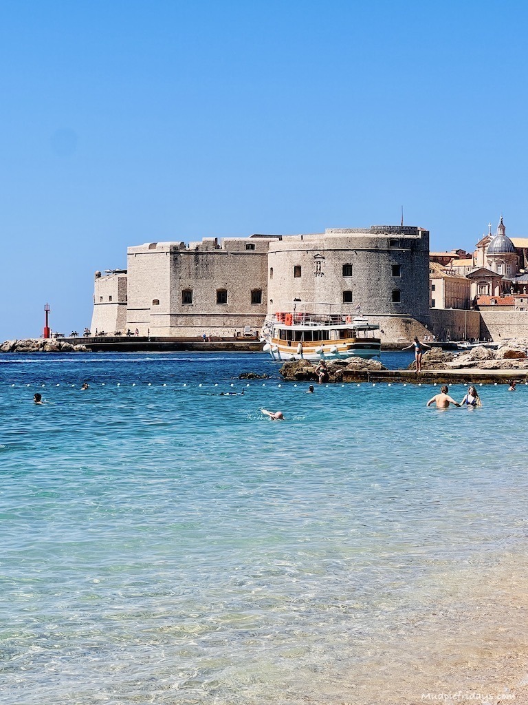 Banje beach looking back towards the old town in Dubrovnik
