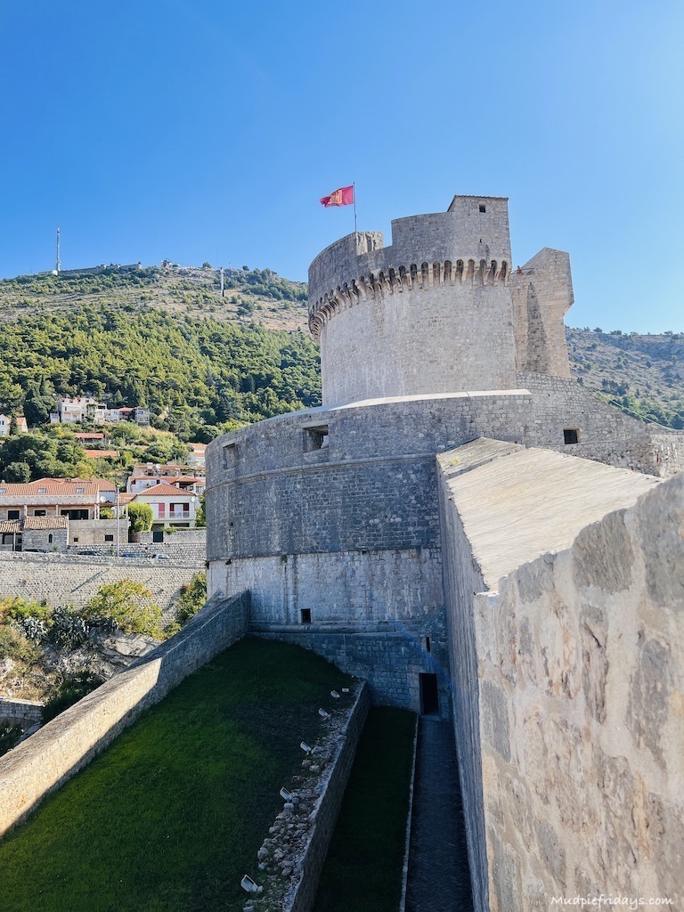Looking back at the Minčeta Tower while walking city walls Dubrovnik