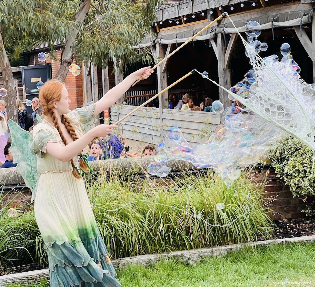 The fairies with bubbles outside the thinkery