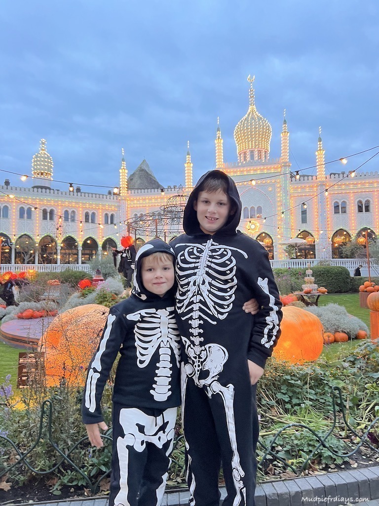the boys outside of nimb at Halloween