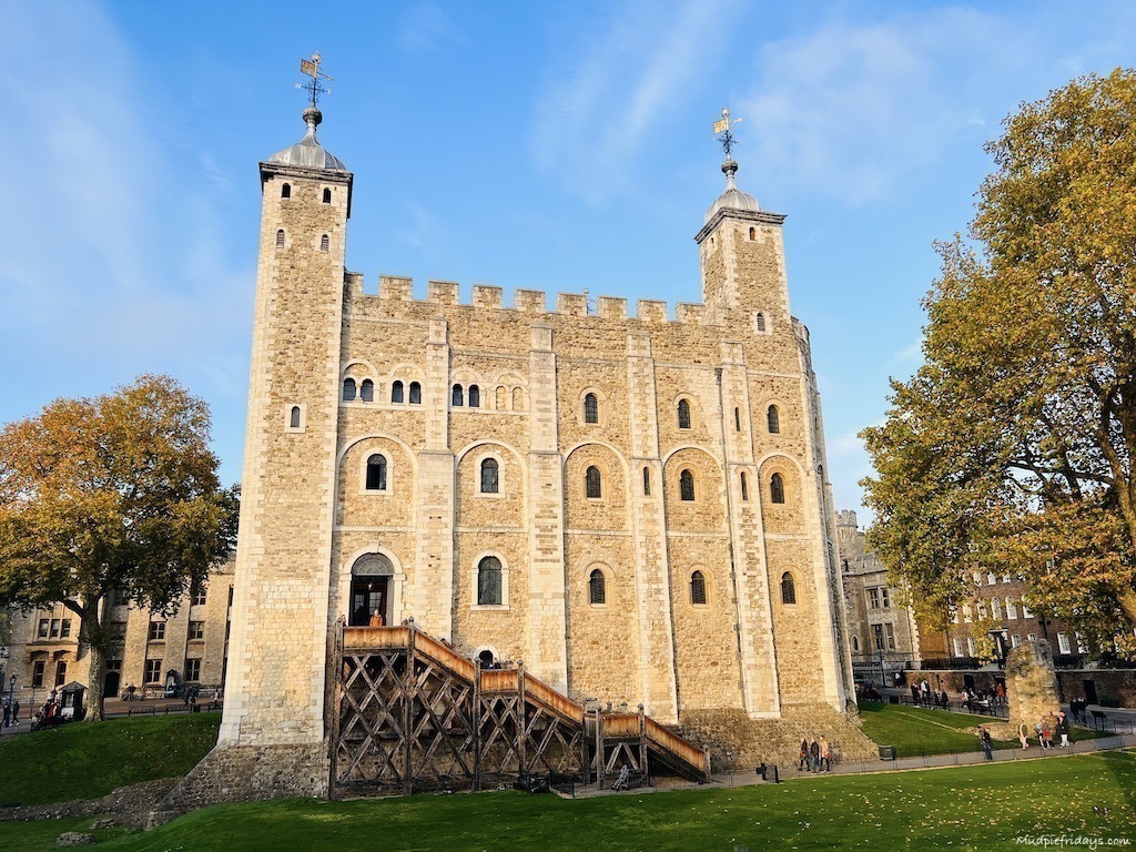 the white tower with the afternoon sun on it taken from the battlements at the tower of london