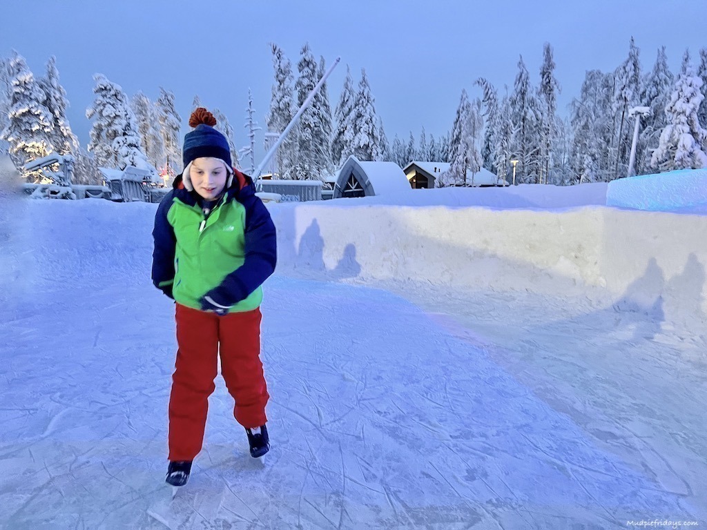 Charlie ice skating in Rovaniemi lapland