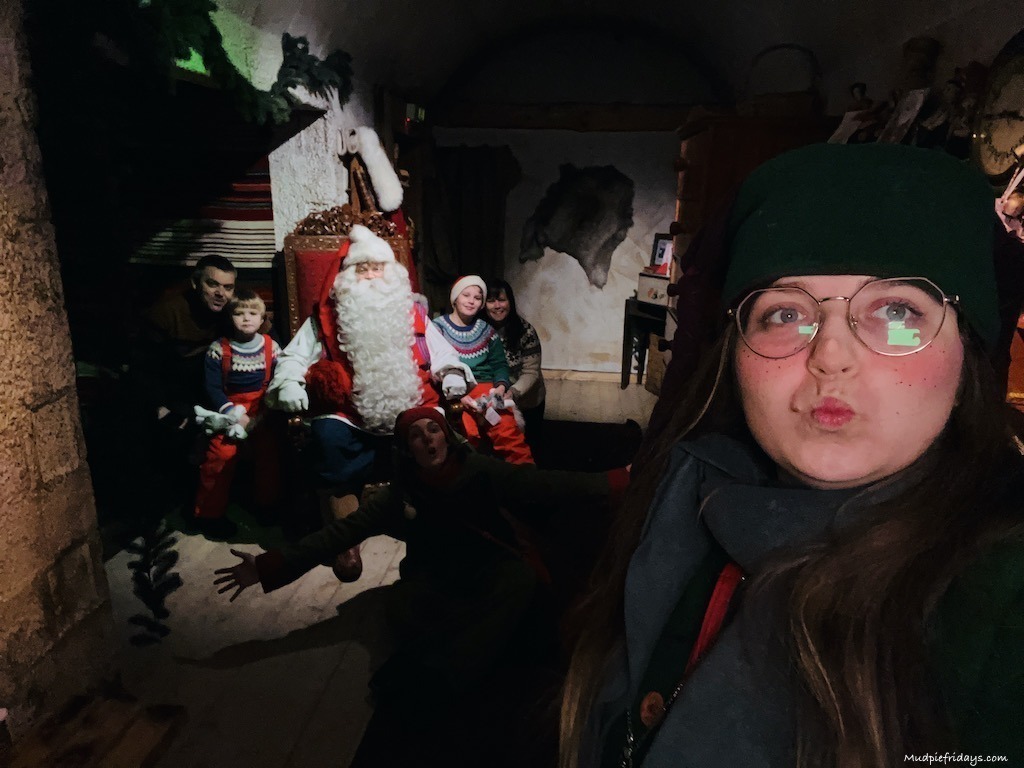 The elves photo bombing our pictures with santa during the Santa Claus Secret Forest Joulukka in lapland in Rovaniemi