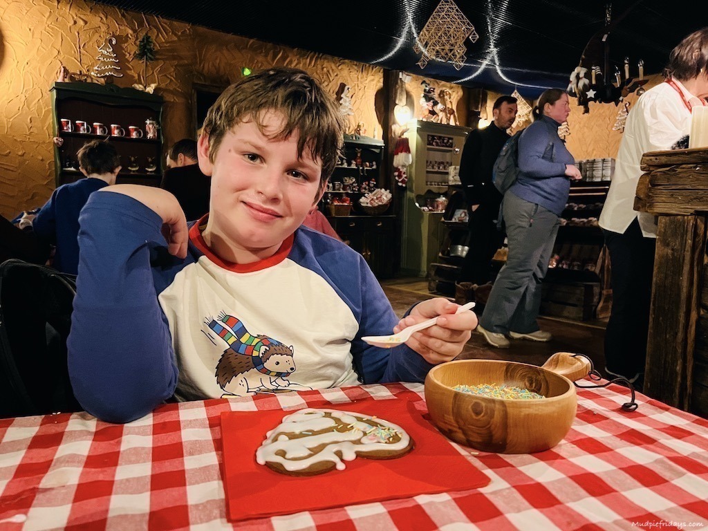 Charlie decorating gingerbread cookies