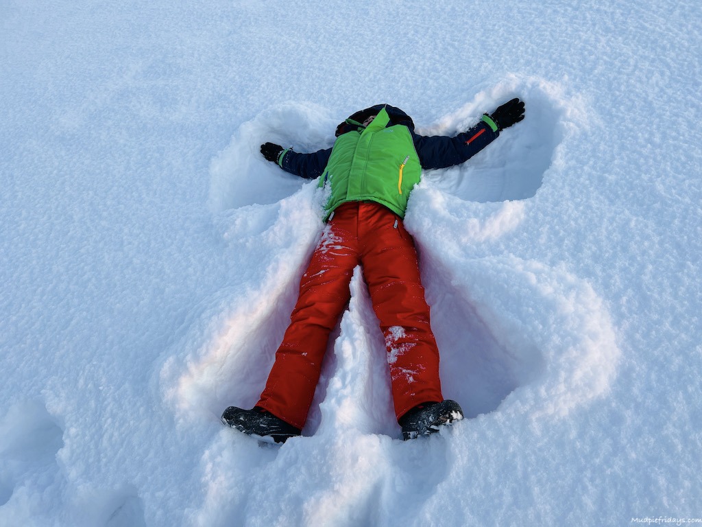 Charlie making a snow angel