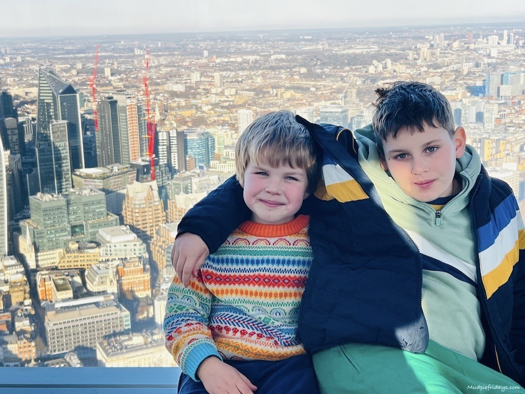 My boys with an Ariel shot of London in the background