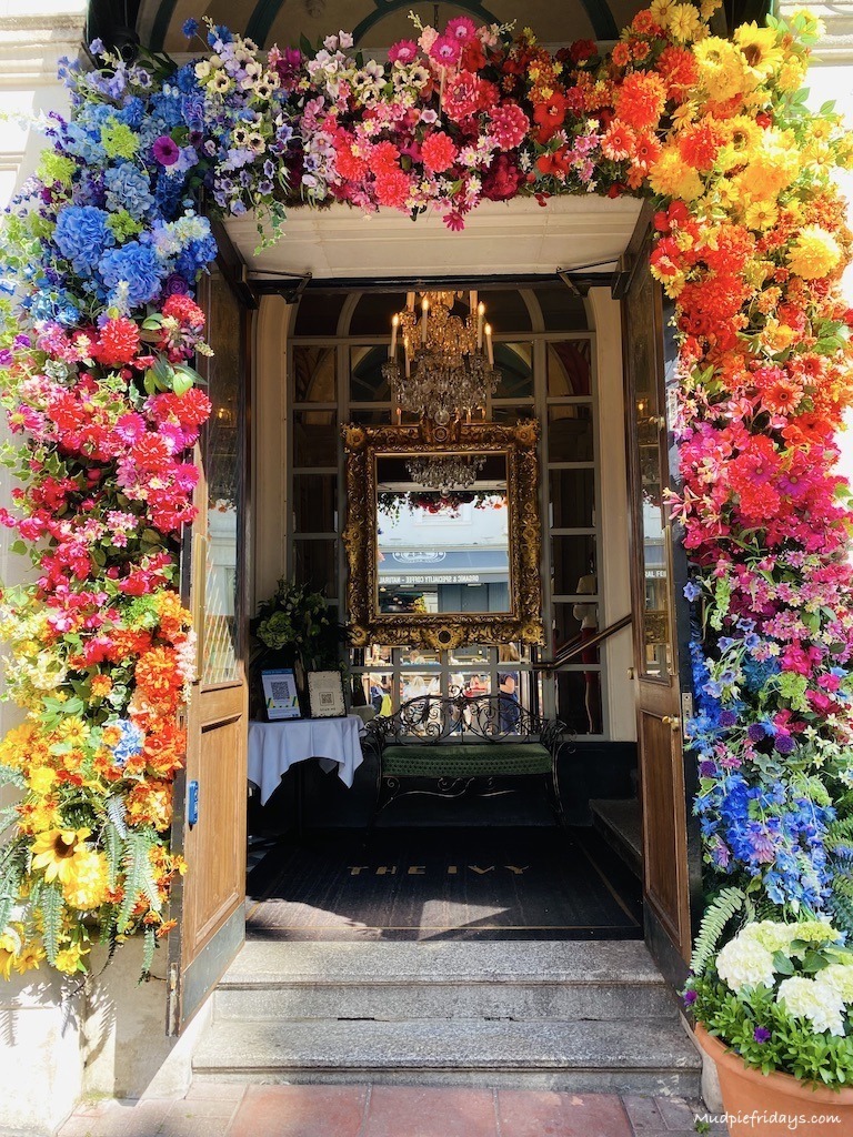 The front of the Ivy in Brighton with rainbow flowers. cream tea Brighton