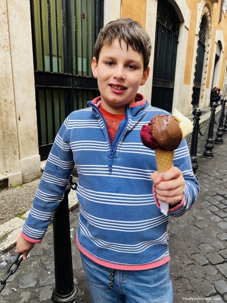 Charlie holding a medium ice cream cone
