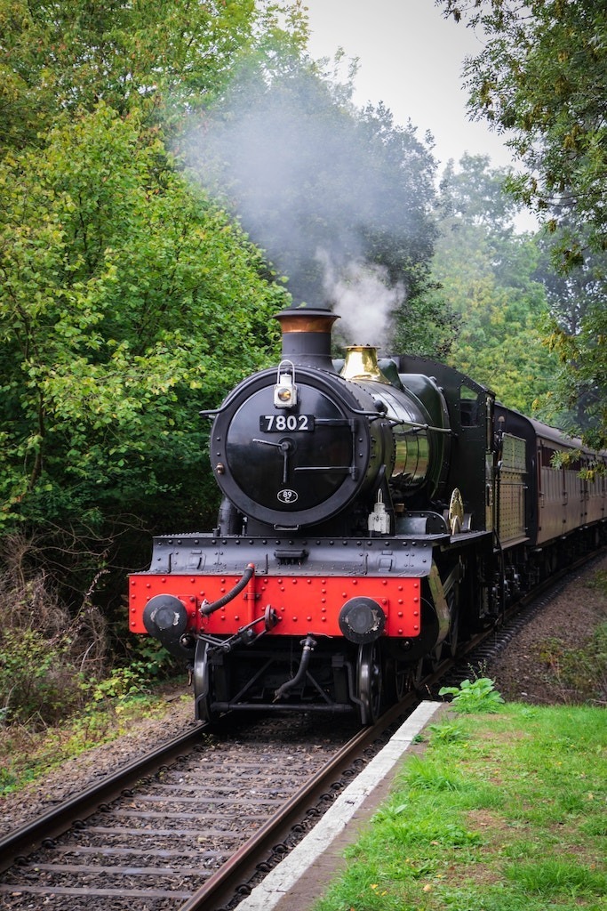 Steam train coming down the tracks in the UK