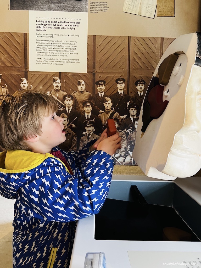 Harry enjoying the interactive displays at IWM Duxford