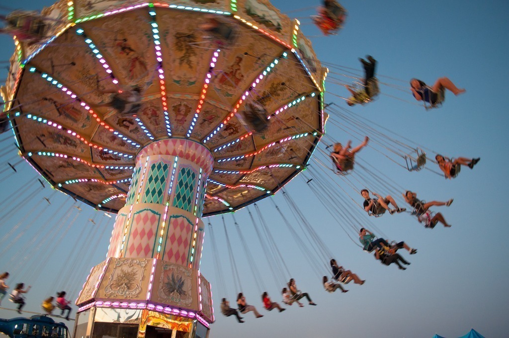 Fairground rides - chair ride all lit up as light fades