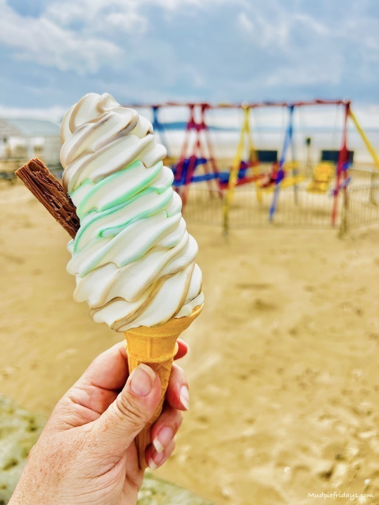 rainbow ice cream at weston-super-mare seafront with chocolate flake