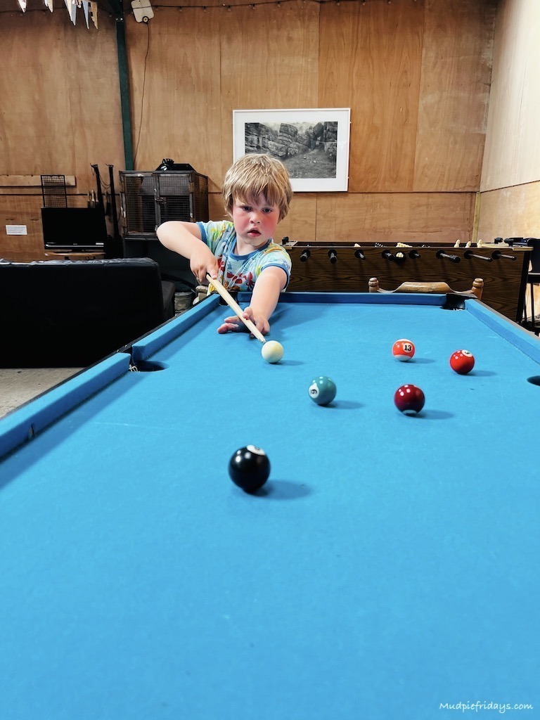 Harry trying out pool