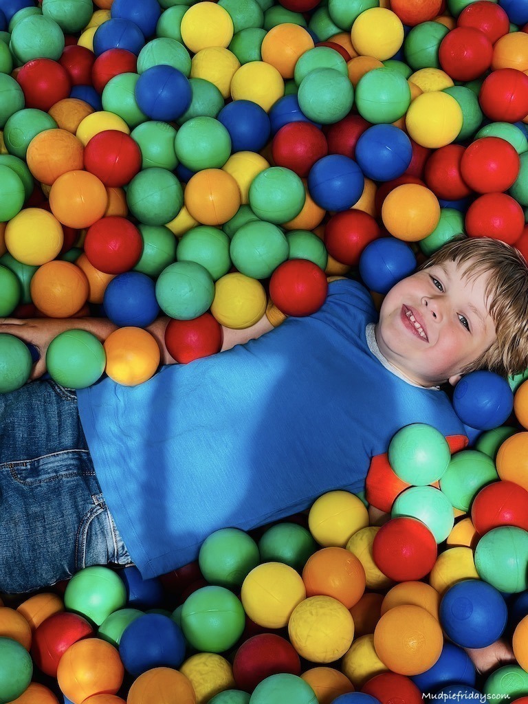 Harry in the ball pit at the ball lake