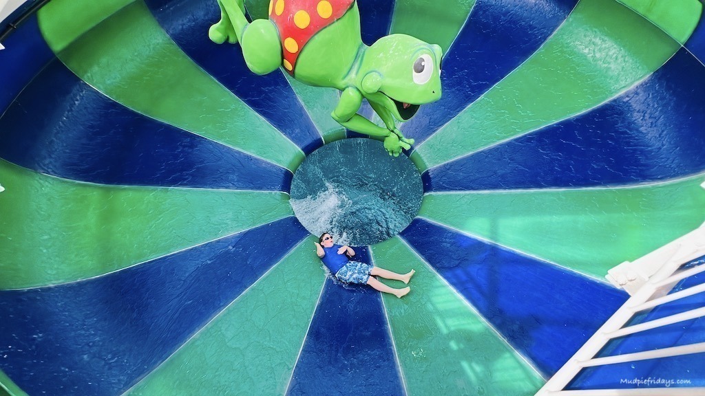 Charlie going down Cycloon a space bowl water slide at Duinrell waterpark