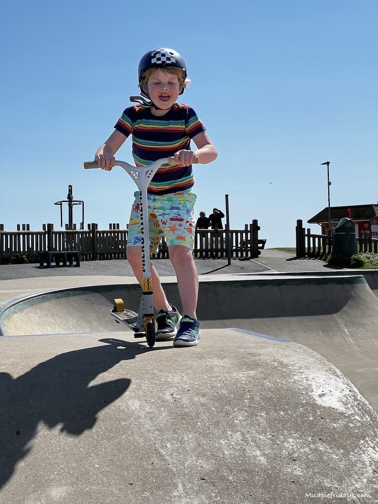 Harry on his scooter in the skate park
